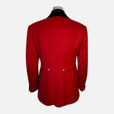 Back view of a custom maroon wool hunting coat with elegant tailoring and a classic British style.